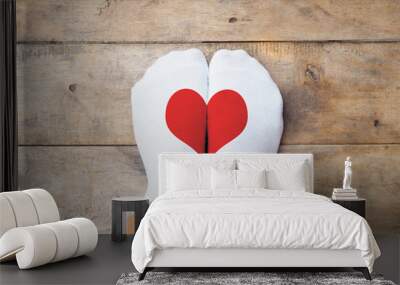  feet wearing white socks with red heart shape Wall mural