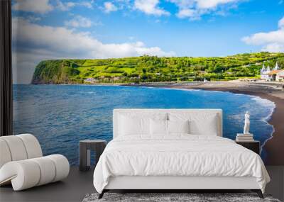 Almoxarife black sand volcanic beach with blue ocean on coast of Faial island, Azores, Portugal Wall mural