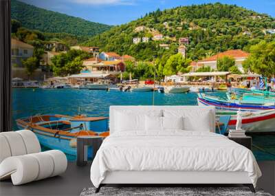 Colorful Greek fishing boats in port of Kioni on Ithaka island, Greece Wall mural