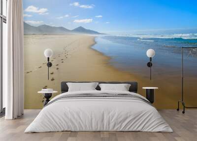 Footprints in sand on Cofete beach, Fuerteventura island Wall mural