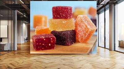 A colorful traditional French fruit jellies (Pâte de fruits). It's a sweet dessert which is main ingredients are concentrate fruits paste, sugar and pectin surrounding with sugar crystal  Wall mural