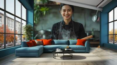 Smiling Asian Female Chef Preparing Healthy Meal in Restaurant Kitchen Wall mural