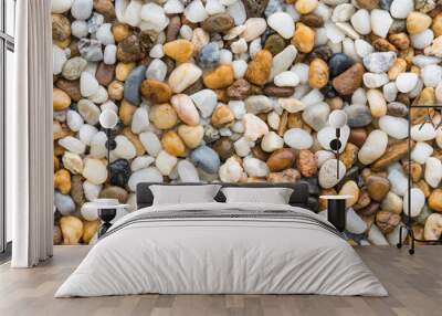 Flat lay of wet sea stones texture background. Abstract shape pattern from nature. Wall mural