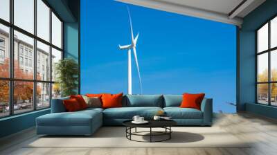 Wind turbines generating electricity with blue sky Wall mural