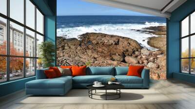 Wonderful landscape with the blue beach at the hiking trail at Robberg Nature Reserve in Plettenberg Bay, South Africa Wall mural