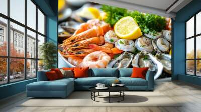 A beautifully arranged seafood platter with shrimp, oysters, crab legs, and mussels, garnished with lemon wedges and fresh herbs. Wall mural