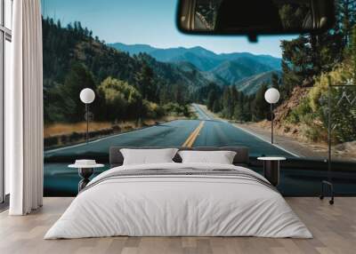 A driver's perspective during a long road trip, capturing the essence of travel Wall mural