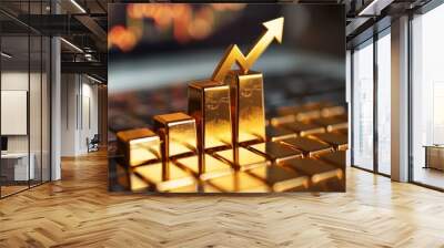 A golden bar graph with arrow pointing upward, depicting a rise in gold prices Wall mural