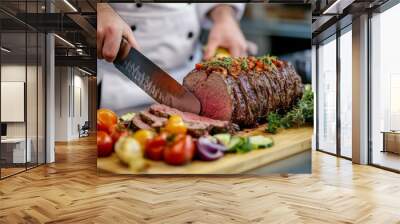 A high-resolution image of a chef slicing a succulent roast beef with a sharp knife, surrounded by vegetables and garnishes on a cutting board in a professional kitchen. Wall mural