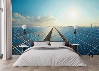 A wide-angle view of a solar power plant, with rows of solar panels stretching into the distance. Wall mural