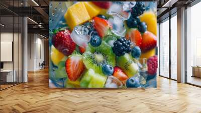 Close-up of a blender filled with a delicious mix of fresh fruits and ice cubes, ready to be blended into a refreshing and hydrating smoothie. Wall mural