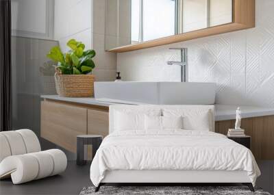 Close-up of a minimalist bathroom with a clean design, floating vanity, and geometric tiles Wall mural