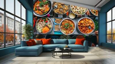 Thai street food: A bustling market scene showcases an array of vibrant Thai dishes, enticing with their aromatic flavors and spices. Wall mural