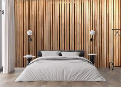 Wooden wall background with vertical slats, texture of natural wood paneling for interior design or backdrop. Wooden paneling wall.  Wall mural