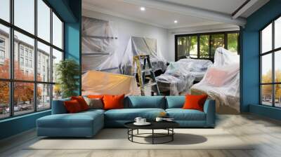 living room covered with plastic for painting  Wall mural