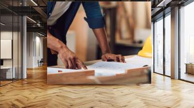 African american carpenter man working in wood factory, small business wood workshop. Timber industry and furniture factory. Wall mural