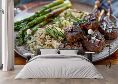 A plate of lamb chops and risotto with asparagus Wall mural