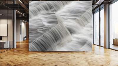 White Water flowing over weir low-level view at long exposure for blurred water effects and textures  Wall mural