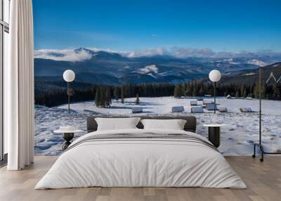 Beautiful winter panoramic view snow capped mountains Wall mural