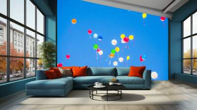 colorful balloons flying in the blue sky Wall mural