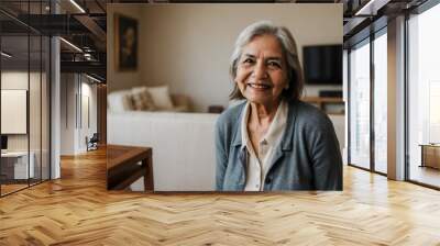 Aged Latin American woman relaxing in her house. Happiness at home, Retirement concept. Wall mural