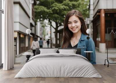 Attractive young girl traveling to a beautiful place in Japan, smiling and looking at the camera with copy space. Wall mural