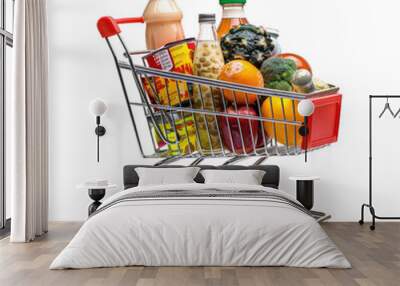 A shopping cart full with various groceries Wall mural