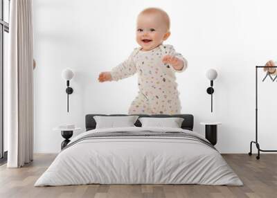 A Set of baby taking their first steps with a joyful smile, wearing a cute onesie, isolated on a transparent background Wall mural