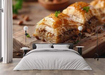 Selective focus image of nut filled baklava on wooden backdrop Wall mural