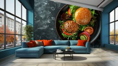 Photo of a plate with salad and burger on a dark background in a top view. There is empty space on the right side for text. It is a high quality photograph in the style of raw photography. Wall mural