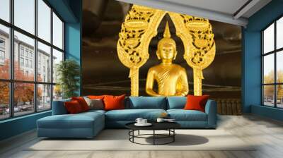 Powerful gold buddha statue Wall mural