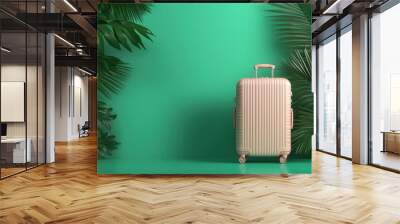 Elegant beige suitcase against a vibrant green background with tropical leaves, symbolizing travel and adventure. Minimalist vacation concept. Wall mural