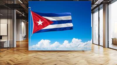 Cuba flag fly against blu sky background Wall mural