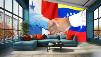 Handshake on Panama and Venezuela flag background. Wall mural