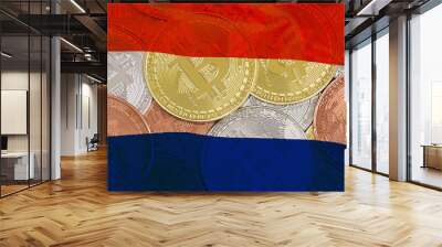 Mining in Netherlands. Bitcoins on the background of the Netherlands flag. Concept for investors in cryptocurrency and Blockchain technology in Netherlands Wall mural