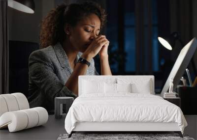 Portrait of tired woman manager with, overtime, at night in the office Wall mural