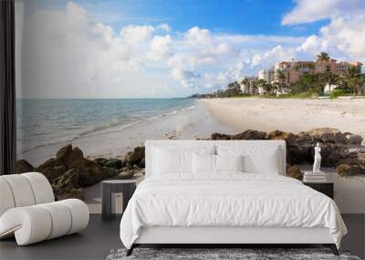 Amazing landscape in Naples beach, Gulf of Mexico, Southwest Florida, USA. Idyllic spot of the beach in this family vacation and relax spot. White sand and calm water. Wall mural