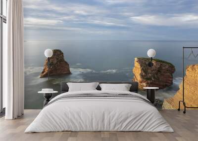 Two large rocks in the sea called the Gemelles in Hendaye, coast of France. Wall mural