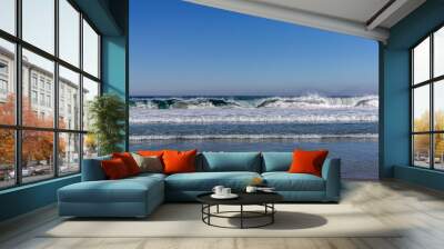 Waves in the ocean with blue sky Wall mural