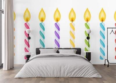 Birthday cake candles with fire flame. Spiral wax sticks with burning wick isolated on white background. Vector cartoon set of colored striped candles for holiday party or christmas celebration Wall mural