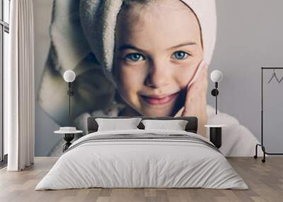 Funny young girl with a mask for skin face, beauty concept Wall mural