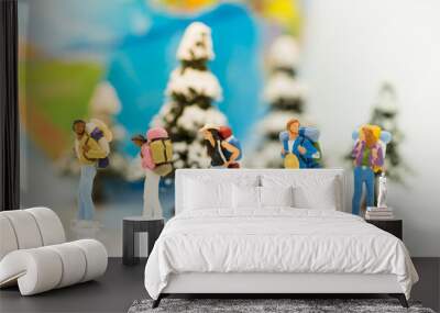 Miniature people, travelers with backpack walking to destination using as travel businees concept Wall mural