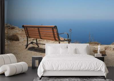 Wooden forged bench on the Dingli cliffs, with sea view. Malta Wall mural