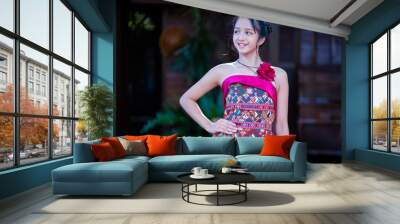 Fashionable portrait beautiful girl. Hill tribe clothing has been redesigned to suit the current era and modern city people's lifestyle. Wall mural