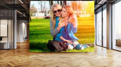 two girls having fun in the park Wall mural