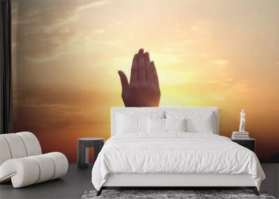 Human hands open palm up worship god on Sunset background with cross on white, Generative AI Wall mural