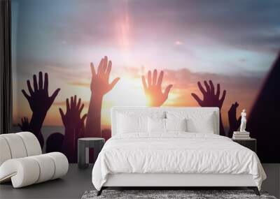 Worship and praise concept: christian people hand rising on sunset background, Generative AI Wall mural