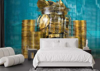 Double exposure of coin stack with stock market screen chart board and candle stick for financial business and investor analysis concept. Wall mural