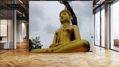 golden buddha with steel structure Wall mural