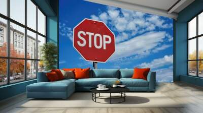 Stop Sign Road. Red Traffic Sign on Blue Sky Background Wall mural